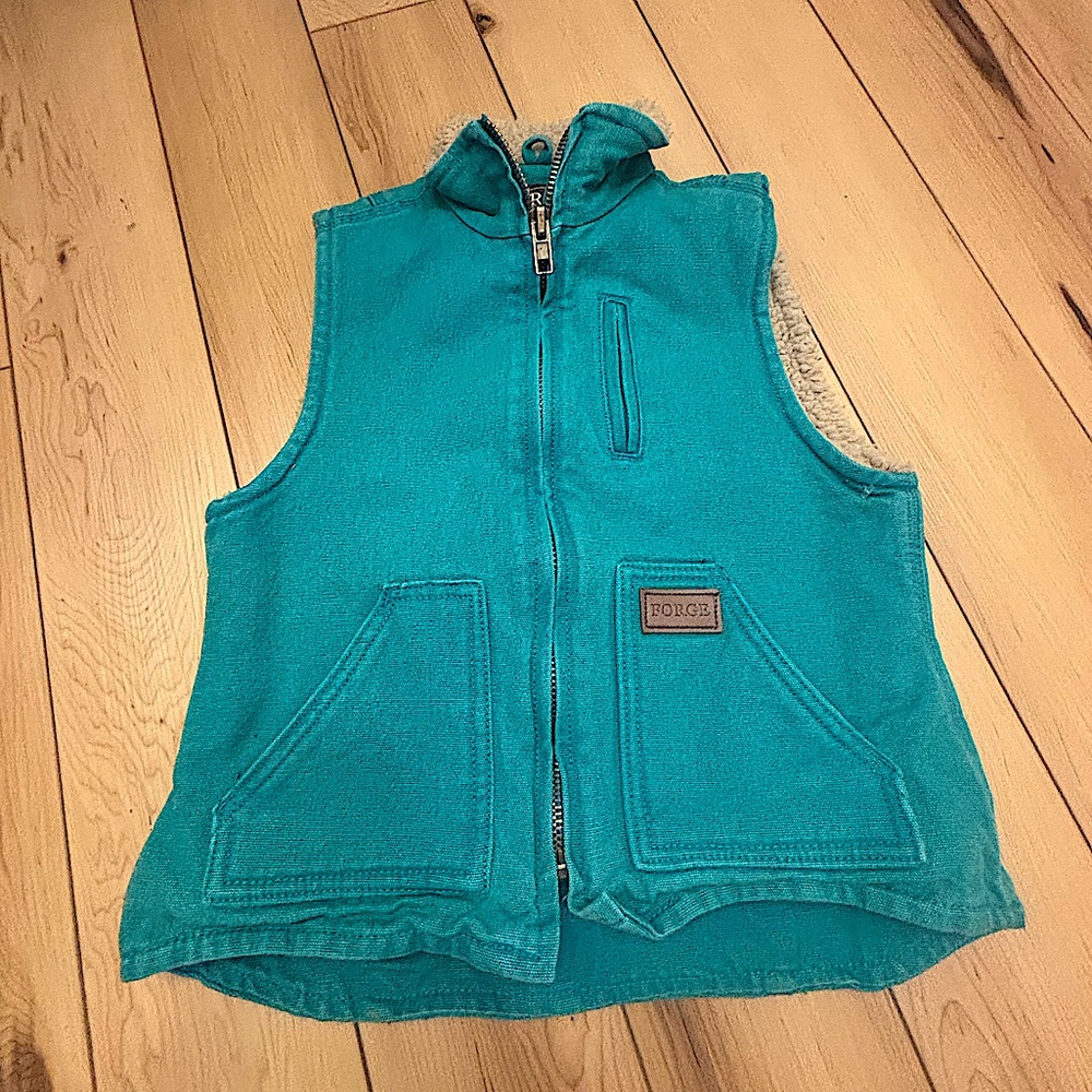 this is a really cute vest and I have grown out of it so i cant wear it no more.